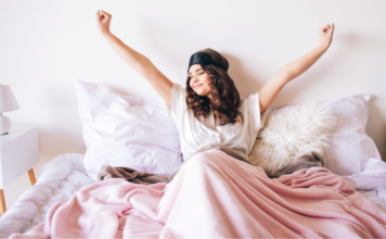 Early to Bed, Early to Rise A woman waking up refreshed.